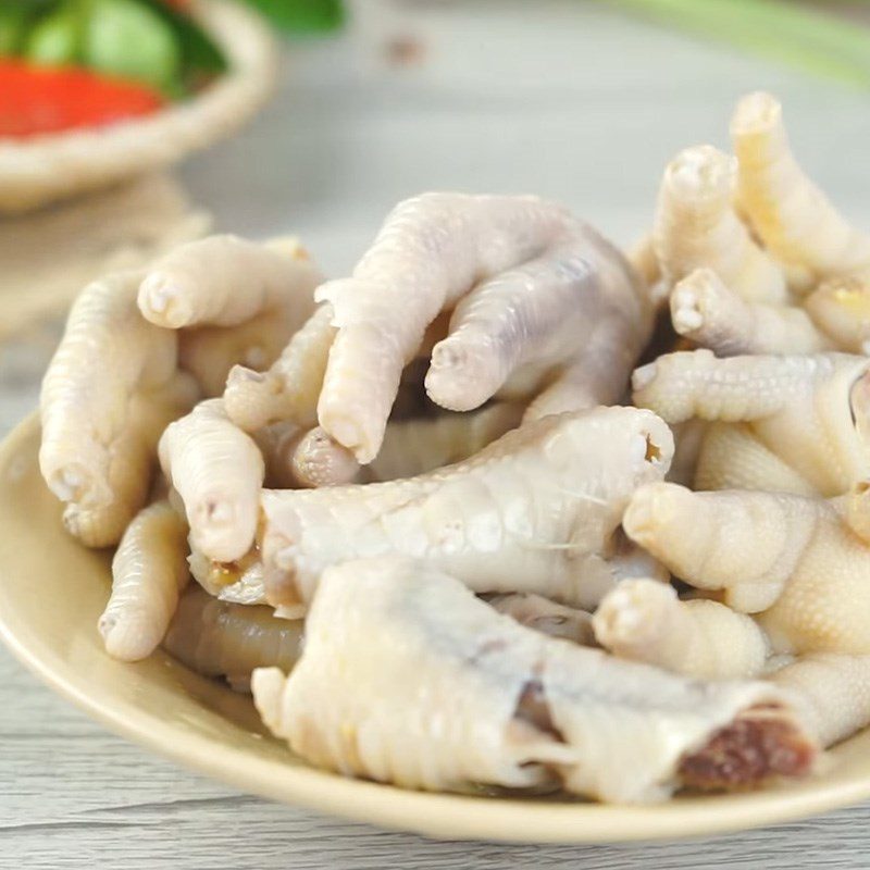 Step 1 Prepare chicken feet Chicken feet soaked in lemongrass and kumquat in Thai style