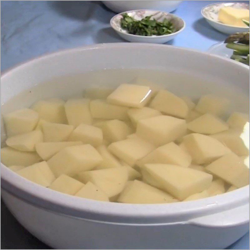 Step 2 Prepare potatoes and asparagus for pork steak with mashed potatoes