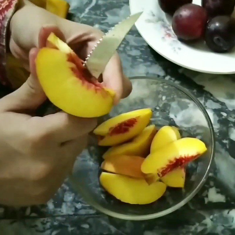 Step 1 Prepare the plums and peaches for Plum Peach Juice