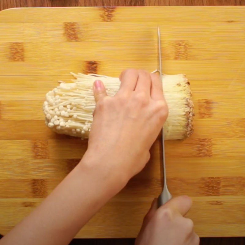 Step 2 Prepare the enoki mushrooms for Beef Ball Soup with Enoki Mushrooms