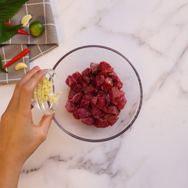 Step 1 Prepare and marinate the beef Beef with Fish Sauce and Kumquat