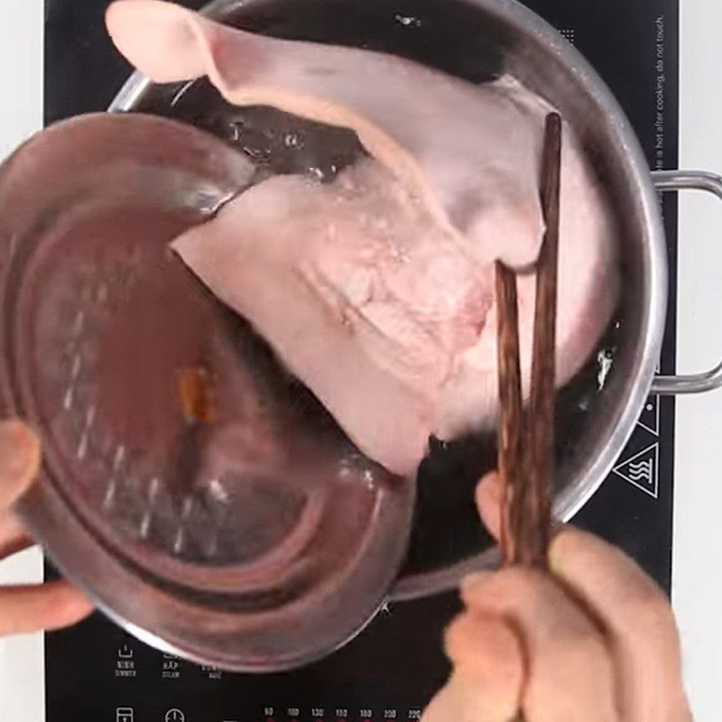 Step 1 Prepare the pork ears Sweet and Sour Tamarind Pork Ears