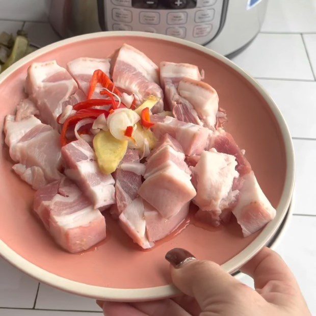 Step 2 Prepare the meat and other ingredients Braised Carp with Pickled Mustard Greens using an Electric Pressure Cooker