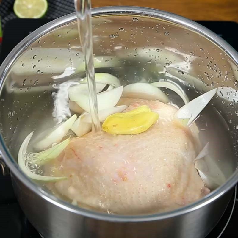 Step 1 Prepare and boil the chicken for Chicken Noodle Soup