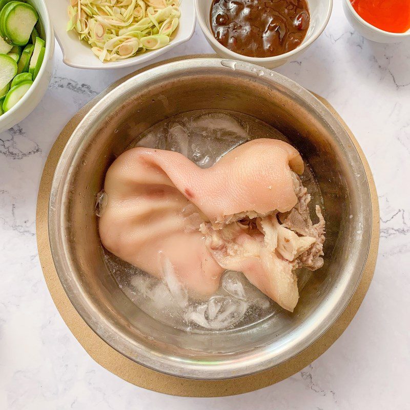 Step 2 Prepare and boil pig's ears Salad with green mango and pig's ears