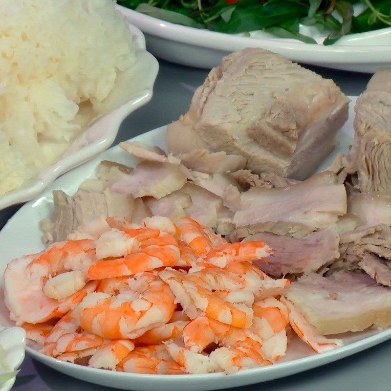 Step 1 Prepare and boil shrimp and pork for Snow Mushroom Salad with Shrimp, Pork, and Lotus Stem