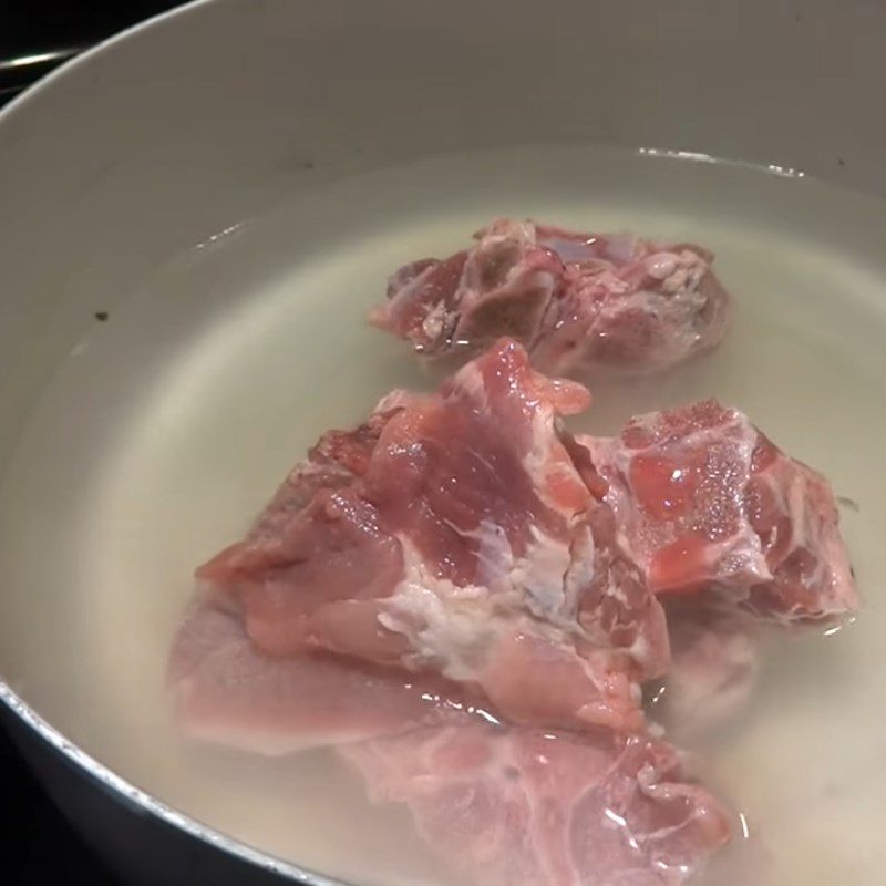 Step 2 Prepare and boil the pork bones Pickled radish soup (xá bấu)