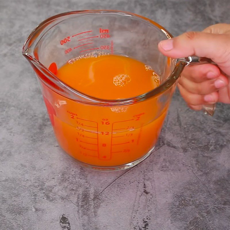 Step 1 Prepare and cook the orange juice mixture for Chewy Orange Coconut Candy