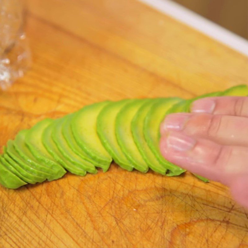 Step 2 Prepare and slice salmon, avocado for sushi birthday cake