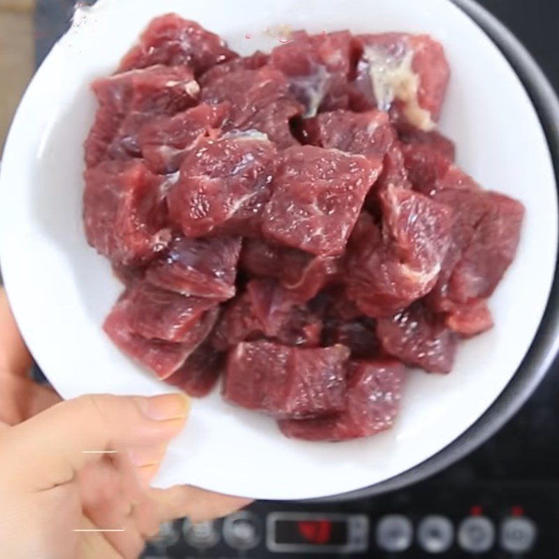 Step 1 Prepare and blanch the beef for Tomato Sauce Beef Stew