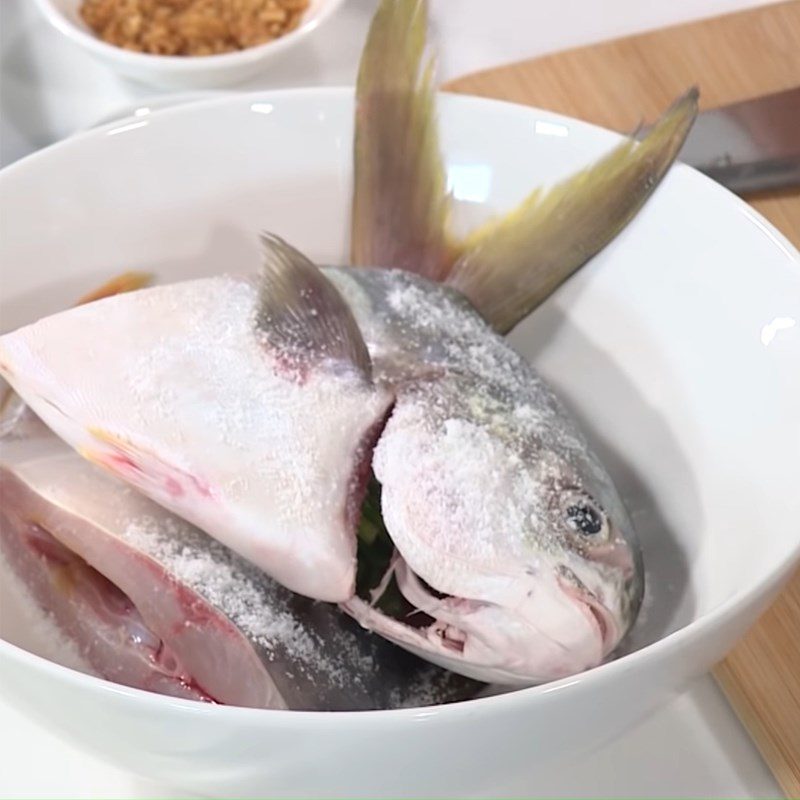 Step 1 Prepare and marinate the fish for Salted Mustard Fish Soup