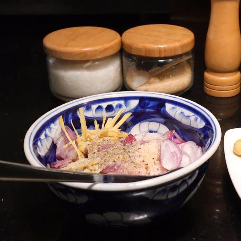 Step 3 Preparing and marinating dried snakehead fish with pork belly