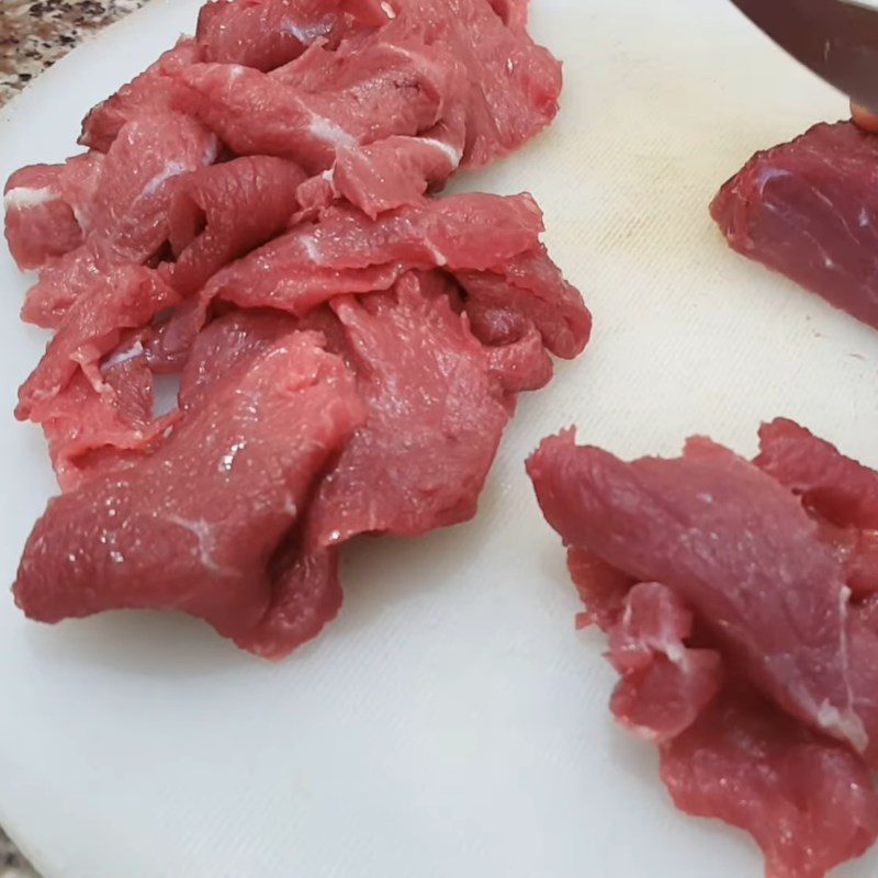 Step 1 Prepare and marinate the beef for Sweet and Sour Beef Pho