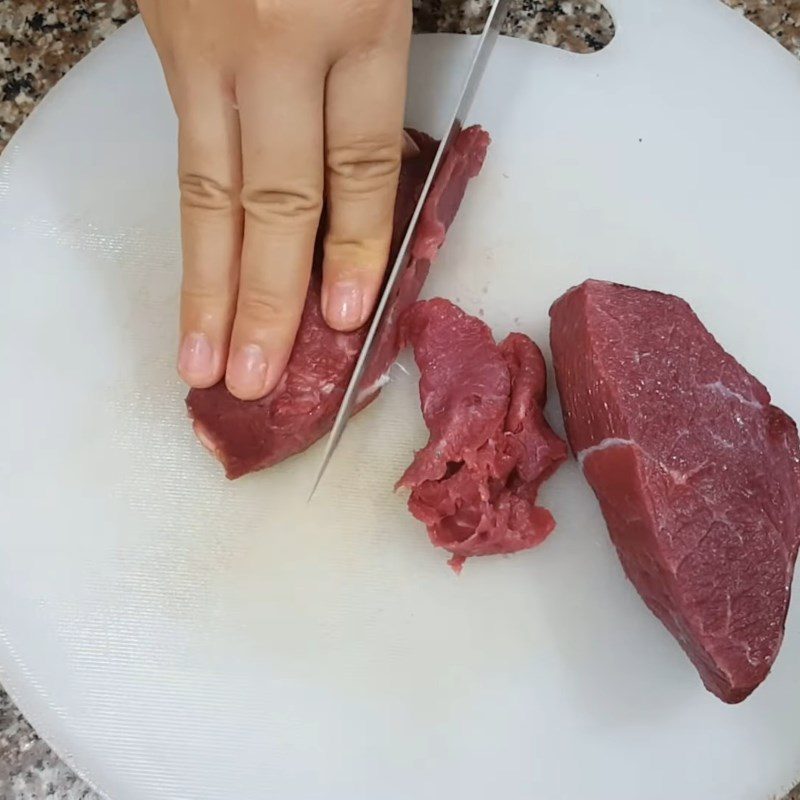 Step 1 Prepare and marinate the beef for Sweet and Sour Beef Pho
