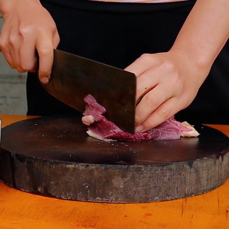 Step 1 Prepare and marinate duck meat Stir-Fried Duck Meat with Water Spinach