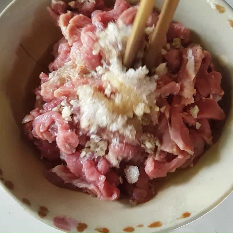 Step 2 Prepare and season the buffalo meat Buffalo meat stir-fried with rice paddy herbs