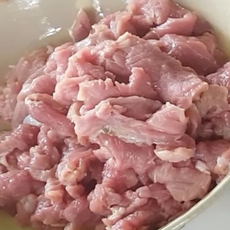 Step 2 Prepare and season the buffalo meat Buffalo meat stir-fried with rice paddy herbs