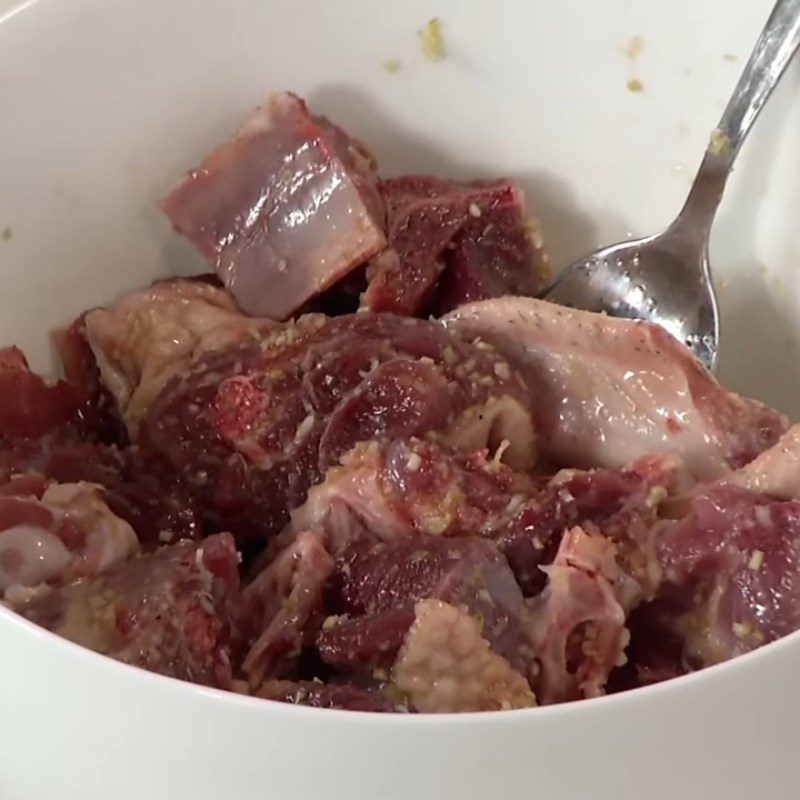 Step 2 Prepare and marinate the duck meat for Duck Braised with Coconut Heart