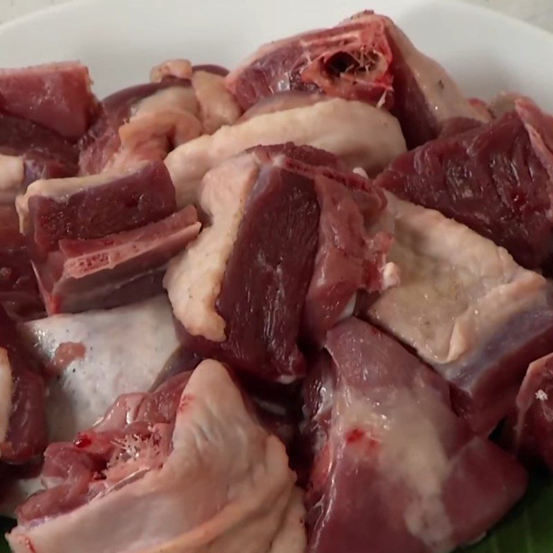 Step 2 Prepare and marinate the duck meat for Duck Braised with Coconut Heart