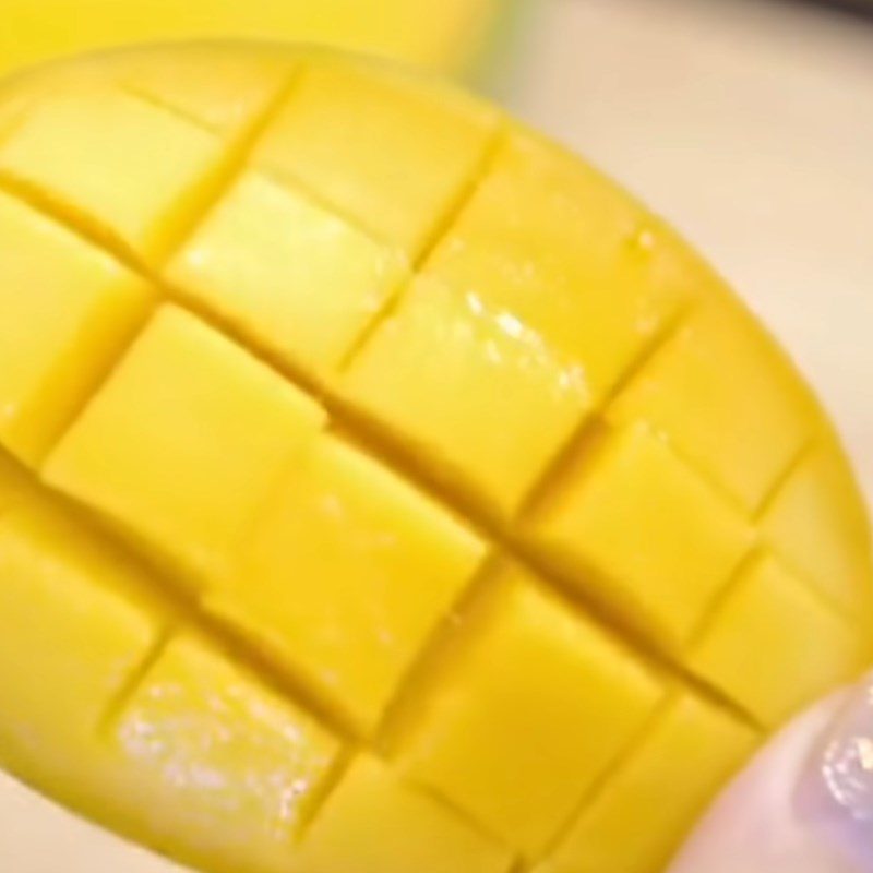 Step 1 Prepare the mango for Mango Aiyu Jelly