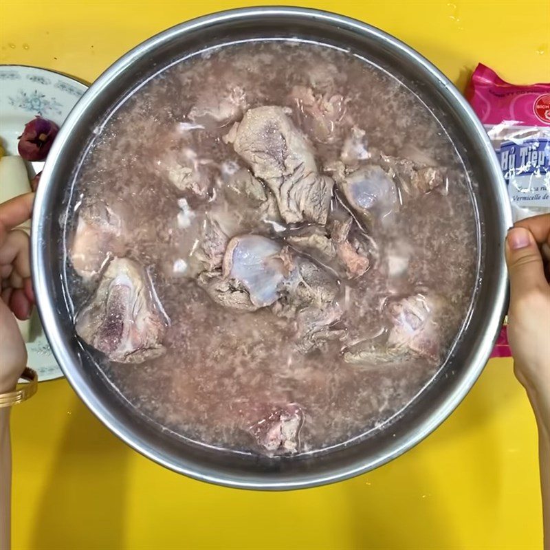 Step 1 Prepare the pork bones for Pork Bone Hu Tieu