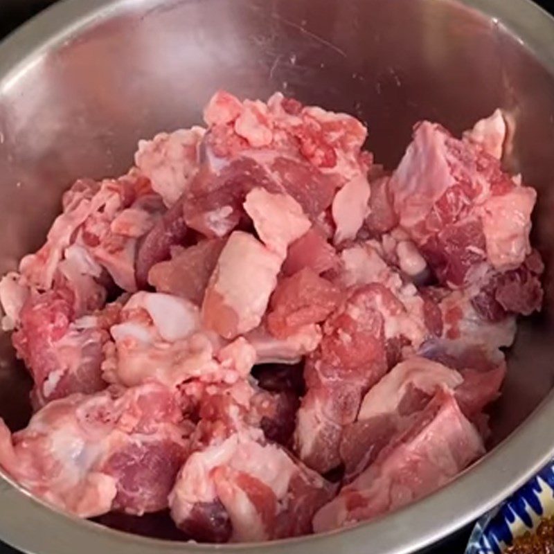 Step 1 Prepare pork bones and other ingredients for Mixed noodle dish with satay