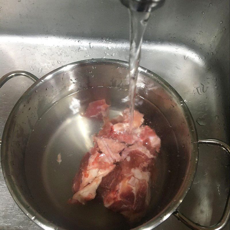 Step 1 Prepare pork bones and other ingredients for Mixed noodle dish with satay