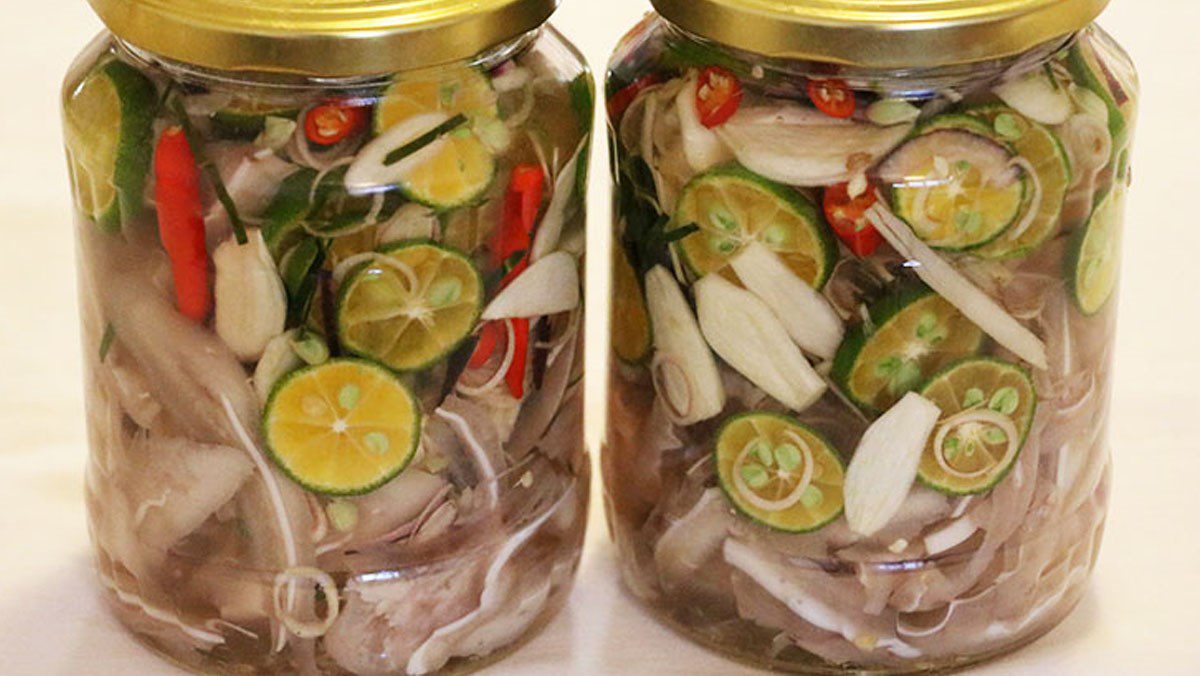 Pig ears pickled with lemongrass and kumquat