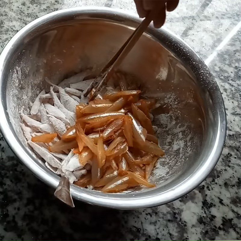 Step 2 Coat with flour and fry the anchovies Fried Anchovies with Fish Sauce