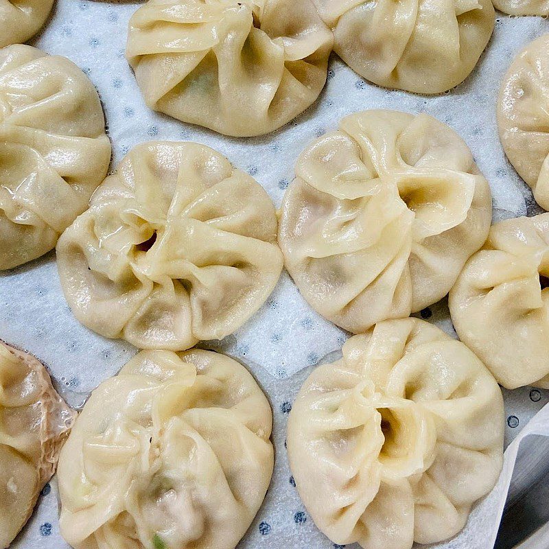 Step 4 Shaping and steaming Xiao Long Bao (Little dragon bun) Xiao Long Bao (Little dragon bun)