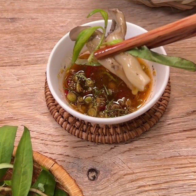 Step 4 Final Product Steamed oyster mushrooms with lemongrass and lime leaves served with dipping sauce