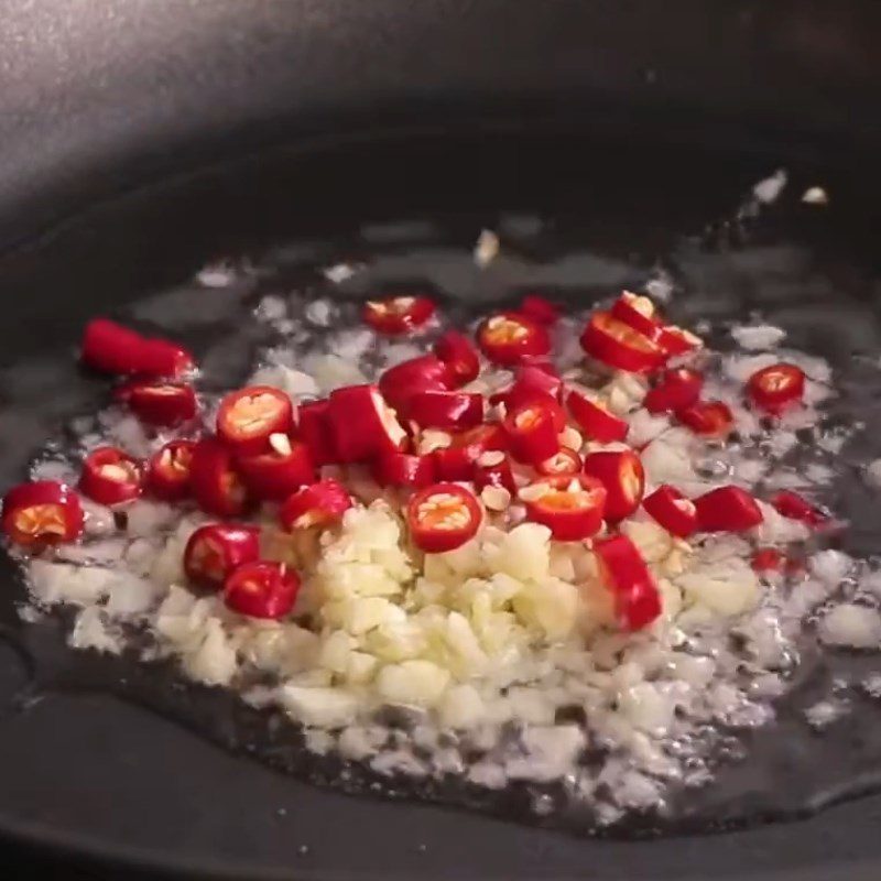 Step 5 Completion Fried basa fish stomach with garlic and chili