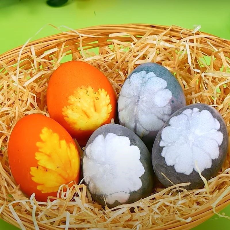 Step 4 Final product Decorating colored eggs with flowers and leaves