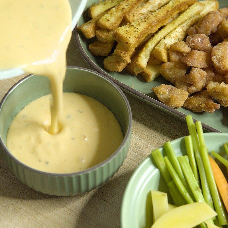 Step 8 Final product Melted cheese sauce and side dishes