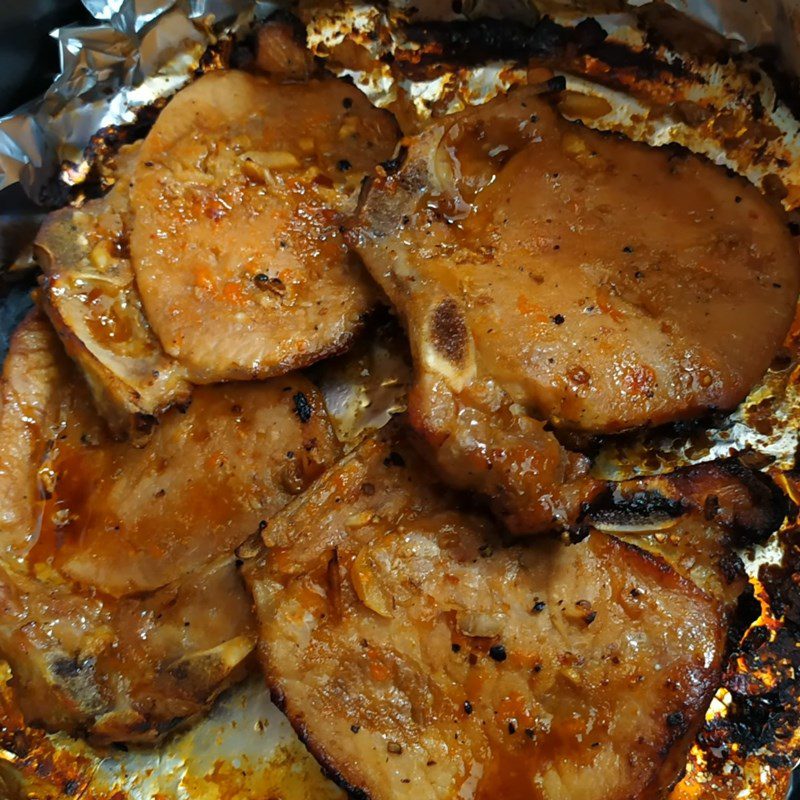 Step 4 Finished Product Grilled pork ribs wrapped in aluminum foil using an air fryer