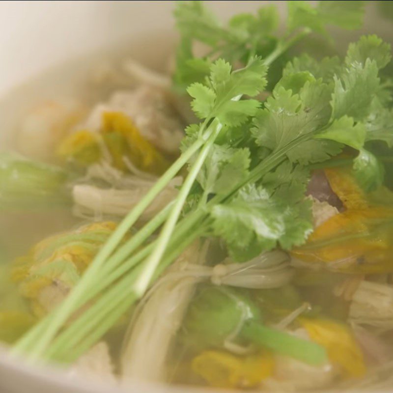 Step 5 Final product Pumpkin flower soup with shrimp and enoki mushrooms