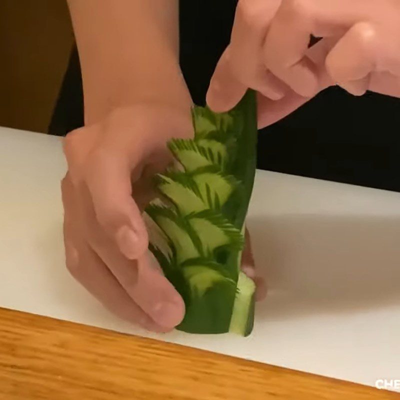 Step 3 Carving the branches and leaves of a pine tree Creating a Christmas tree from a cucumber