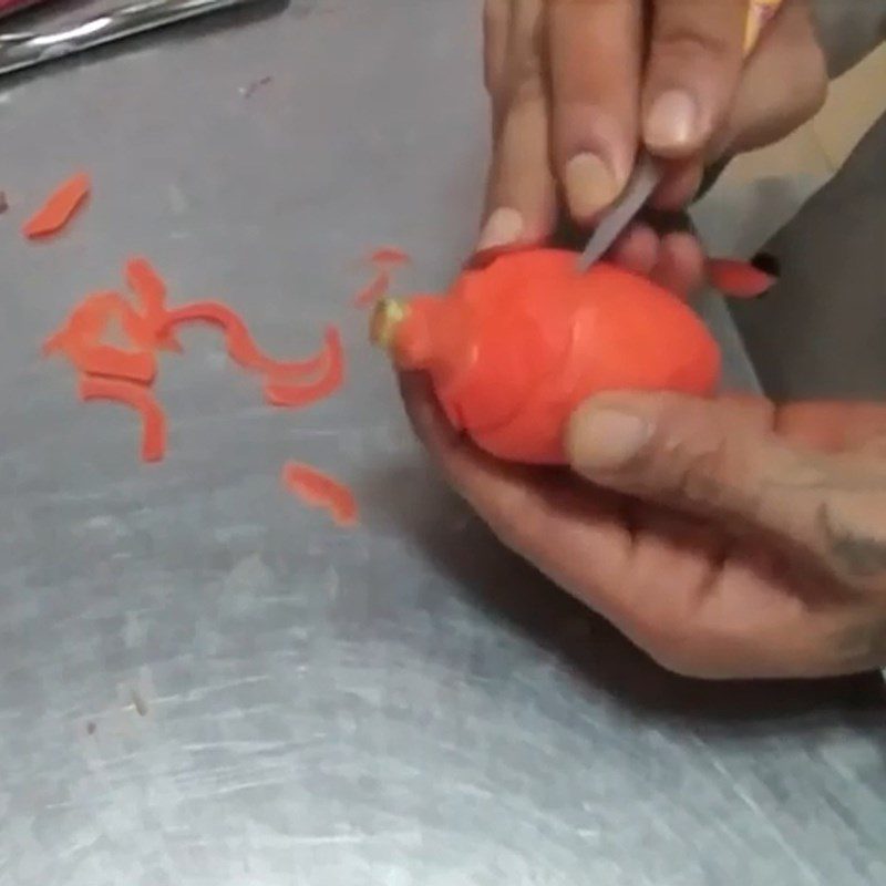 Step 2 Carve the grooves of the pine cone Shape the Christmas pine cone from a carrot