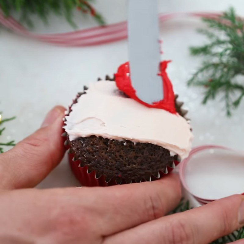 Step 6 Decorating the Santa Claus figure Santa Claus cupcake