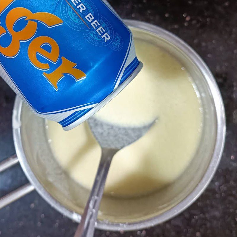 Step 1 Mixing Bánh xèo batter using a non-stick pan