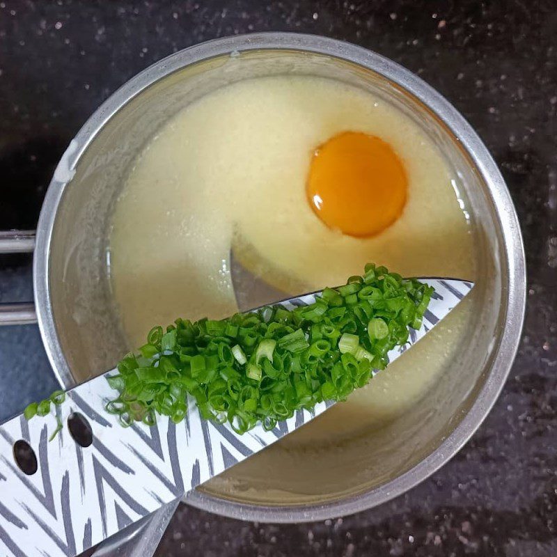 Step 1 Mixing Bánh xèo batter using a non-stick pan