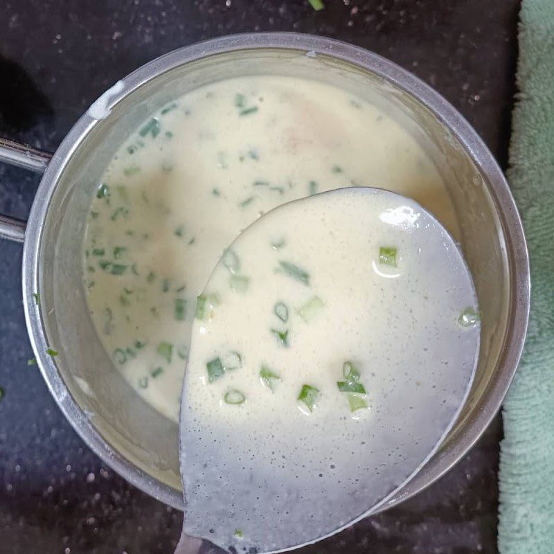 Step 1 Mixing Bánh xèo batter using a non-stick pan