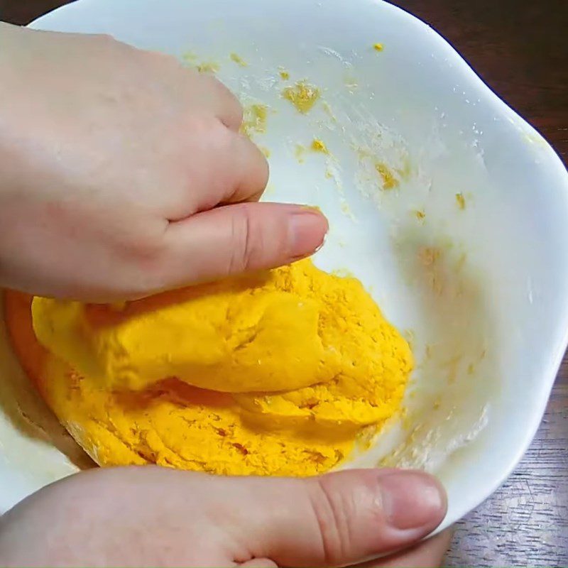 Step 2 Mixing the dough Pumpkin coconut balls steamed