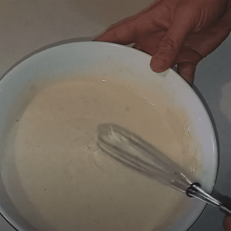 Step 2 Mixing the batter and dipping the bitter melon Crispy fried bitter melon