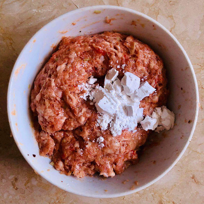 Step 1 Mix the pork paste for Nem lụi