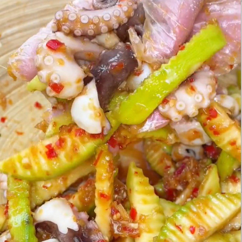 Step 3 Mixing the salad Thai octopus green mango salad (Recipe shared from Tiktok Cooking with TasteVN)