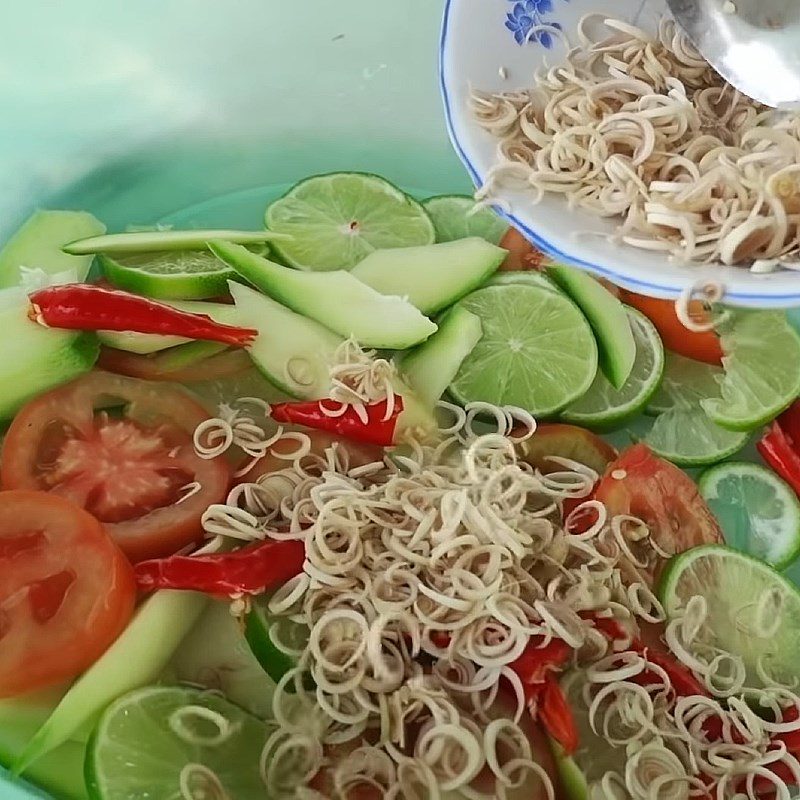 Step 4 Mix the salad Thai-style octopus salad with lime and chili