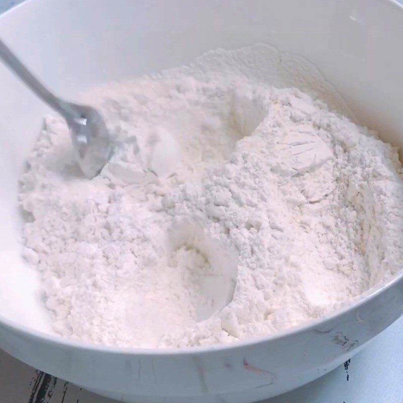 Step 1 Mix flour and egg mixture for Melted Chocolate-Filled Bread