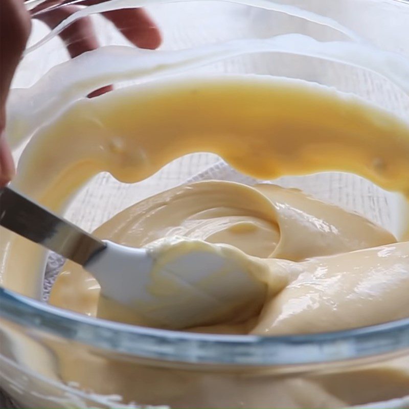 Step 3 Mixing the cheese mixture for baked orange cheesecake with flour