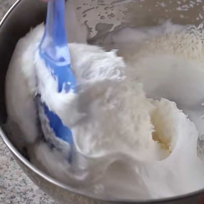 Step 2 Mix the egg mixture with dried coconut flakes Coconut mold cake